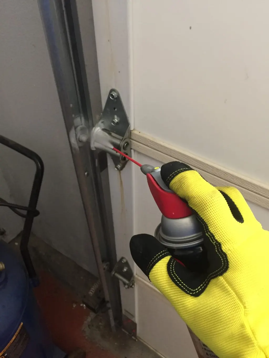 Garage door hardware lubrication and maintenance in Santa Clarita
