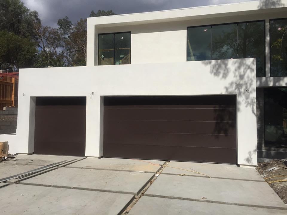 Modern dark garage doors on a Santa Clarita home