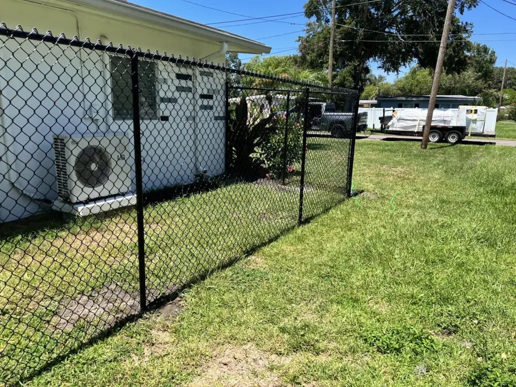 Black chain link fence and gate
