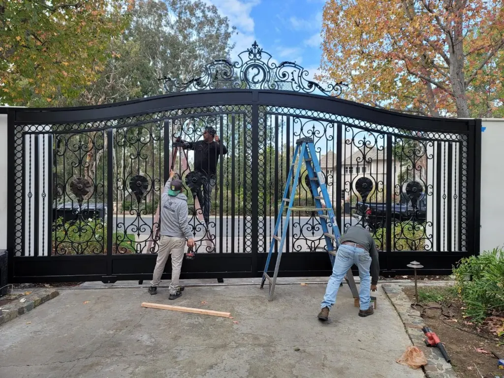 AER crew working on a wrought iron gate